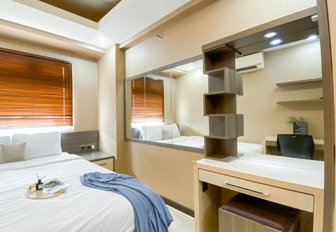 Bedroom Relaxing and Best Price 1BR at Green Pramuka City Apartment By Travelio