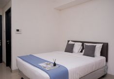 Bedroom 2 Spacious and Minimalist Studio Apartment at Paramount Skyline By Travelio