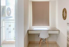 Phòng ngủ 3 Warm and Tidy Studio at Springlake Summarecon Bekasi Apartment By Travelio