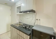 Khu vực công cộng 4 Warm and Tidy Studio at Springlake Summarecon Bekasi Apartment By Travelio