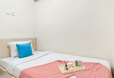 Bedroom 2 Good Place and Modern 2BR at Kebagusan City Apartment By Travelio