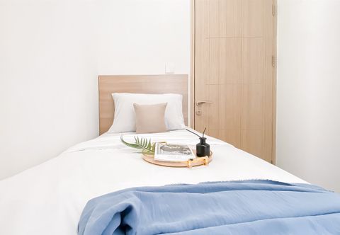 Bedroom Homey and Warm 2BR at Tokyo Riverside PIK 2 Apartment By Travelio