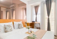 Bedroom 2 Minimalist Studio and Best Deal Apartment Transpark Cibubur By Travelio