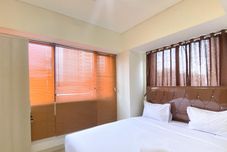 Bedroom Homey and Good Choice 2BR at Meikarta Apartment By Travelio