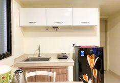 Common Space 5 Comfort Stay and Tidy 1BR with Extra Room at Meikarta Apartment By Travelio