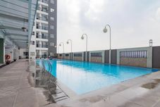 Swimming Pool Cozy Stay and Good 2BR Apartment at Mekarwangi Square Cibaduyut By Travelio