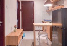 Common Space 4 Homey and Good Place 2BR Asatti Apartment By Travelio