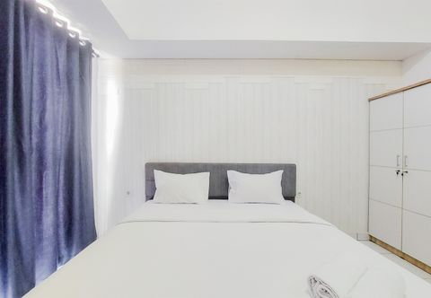 臥室 Enjoy Living and Cozy Studio Casa De Parco Apartment By Travelio