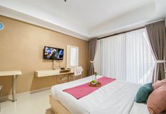 Kamar Tidur 3 Homey and Tidy Studio Apartment at Beverly Dago By Travelio