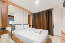 臥室 Comfy and Good Studio at Patraland Amarta Apartment By Travelio