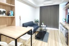 Common Space Elegant and Stunning 2BR at Grand Sungkono Lagoon Apartment By Travelio