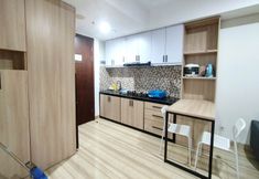 Common Space 4 Elegant and Stunning 2BR at Grand Sungkono Lagoon Apartment By Travelio