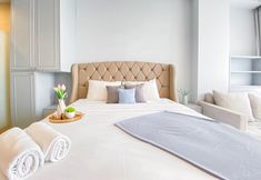 침실 2 Cozy and Minimalist Studio at Apartment Art Deco By Travelio