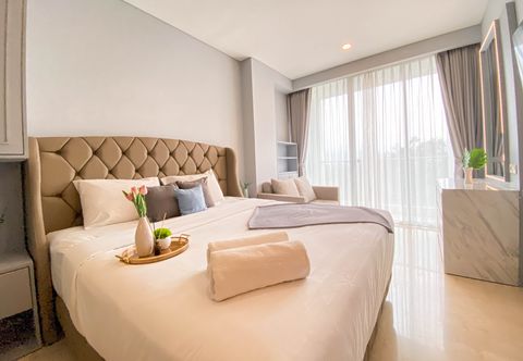 침실 Cozy and Minimalist Studio at Apartment Art Deco By Travelio
