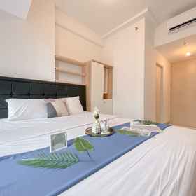 Bedroom 1 Homey and Best Furnished Studio at Tokyo Riverside PIK 2 Apartment By Travelio, Tangerang Hotels