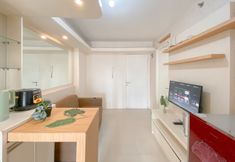 Others 2 Strategic and Comfy 1BR with Extra Room at Bassura City Apartment By Travelio