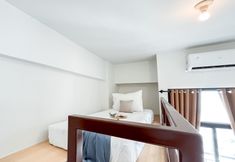 Bedroom 2 Cozy Studio Room Apartment at Dave By Travelio