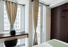 Bedroom 3 Tidy and Comfort Studio at Tokyo Riverside PIK 2 Apartment By Travelio