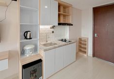 Lobby 5 Studio Modern Style Apartment at Grand Sungkono Lagoon By Travelio