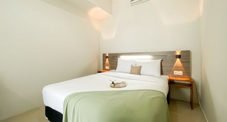 Bedroom 2 Well Designed and Stunning 2BR Apartment at Vittoria Residence By Travelio