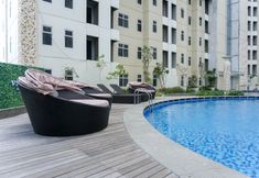 Swimming Pool 6 Stunning and Best Deal 2BR Apartment at Vittoria Residence By Travelio