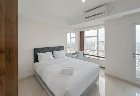 卧室 Strategic Location and Tidy Studio Grand Sungkono Lagoon Apartment By Travelio