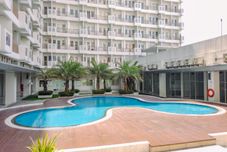 Swimming Pool Homey and Cozy Living 2BR Sentul Tower Apartment By Travelio