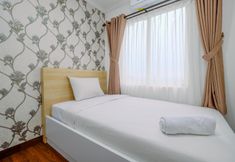 Bedroom 2 Homey and Cozy Living 2BR Sentul Tower Apartment By Travelio
