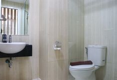 In-room Bathroom 5 Nice and Fancy 2BR at Sentul Tower Apartment By Travelio