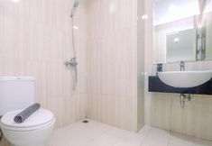 In-room Bathroom 6 Homey 2BR Apartment Sentul Tower near SICC By Travelio