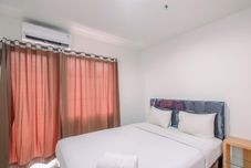 Bedroom Homey 2BR Apartment Sentul Tower near SICC By Travelio