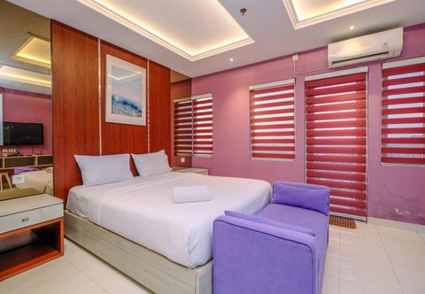 침실 Modern and Homey Studio at Sentul Tower Apartment By Travelio