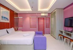 침실 3 Modern and Homey Studio at Sentul Tower Apartment By Travelio