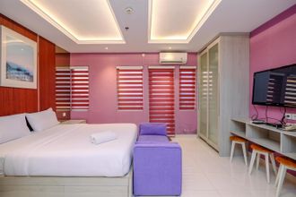 침실 4 Modern and Homey Studio at Sentul Tower Apartment By Travelio