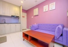 Bedroom 6 Modern and Homey Studio at Sentul Tower Apartment By Travelio