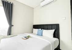 침실 2 Comfortable and Well Designed 3BR Nifarro Park Apartment By Travelio