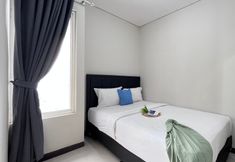 침실 3 Comfortable and Well Designed 3BR Nifarro Park Apartment By Travelio