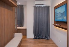 Bedroom 7 Cozy Studio at Sudimara Forestwalk Apartment By Travelio