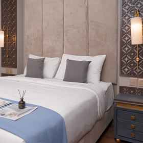 Bedroom 1 Warm Living and Tidy 3BR at Sky House BSD Apartment By Travelio, South Tangerang Hotels