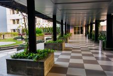 Bangunan Homey and Good Designed 3BR Nifarro Park Apartment By Travelio