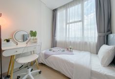 Bedroom 2 Homey and Good Choice 2BR Apartment Tamansari Iswara By Travelio