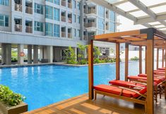 Swimming Pool 7 Homey and Good Choice 2BR Apartment Tamansari Iswara By Travelio