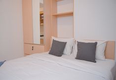 Bedroom 2 Good Furnished and Homey Studio at Tokyo Riverside PIK 2 Apartment By Travelio