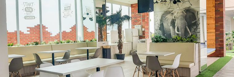 Lobby Cozy Living and Tidy Studio Apartment B Residence By Travelio