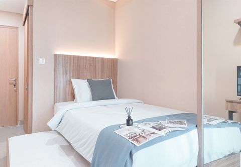 Bedroom Cozy Living and Tidy Studio Apartment B Residence By Travelio