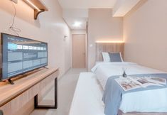 Bedroom 2 Cozy Living and Tidy Studio Apartment B Residence By Travelio