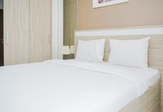 Bedroom 2 Tidy and Cozy Studio Apartment at Springwood Residence Tangerang By Travelio