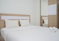 Bedroom 2 Cozy and Enjoy Studio Apartment at Springwood Residence Tangerang By Travelio