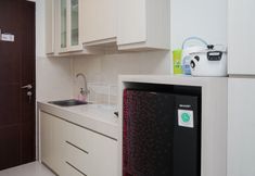 Common Space 4 Nice and Comfort Studio Apartment at Springwood Residence By Travelio