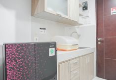 Common Space 4 Cozy and Simple Studio Apartment with Super Single Bed at Springwood Residence By Travelio